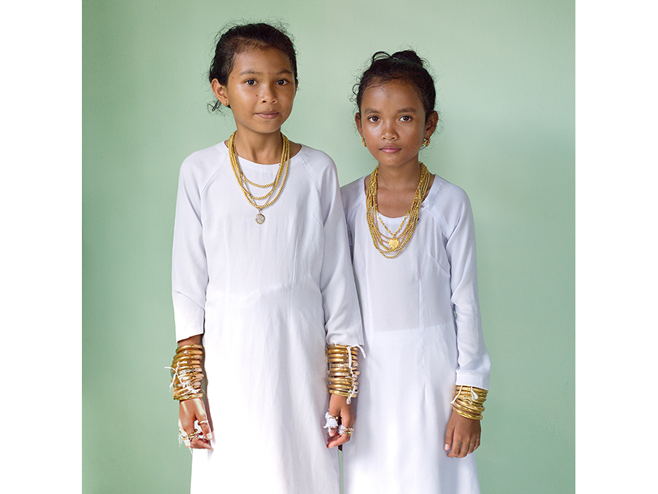 Vietnam - Muslim Cham ethnic minority - A portrait of two girls at their Karoh (maturity) ceremony